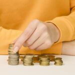 Front view person with coins