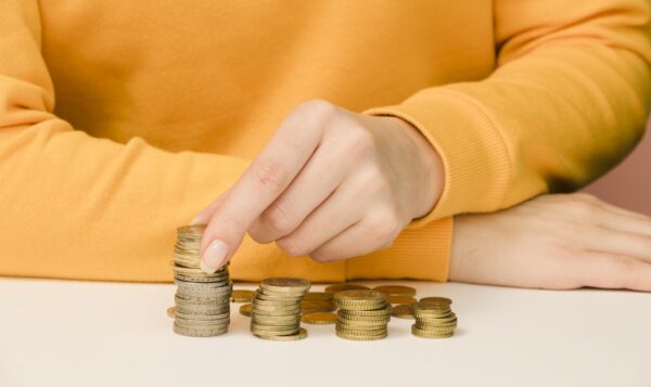 Front view person with coins