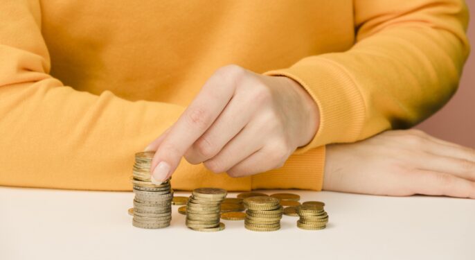 Front view person with coins